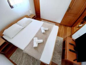 Postel nebo postele na pokoji v ubytování TARA Vila Rajak