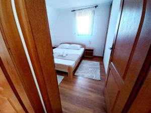 Postel nebo postele na pokoji v ubytování TARA Vila Rajak