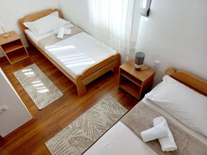 Postel nebo postele na pokoji v ubytování TARA Vila Rajak