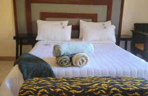 Cama o camas de una habitación en Quest