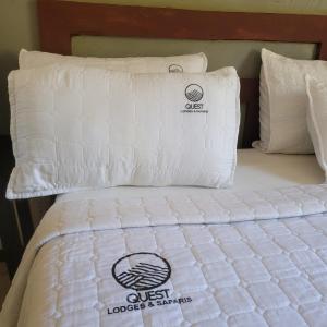 Cama o camas de una habitación en Quest