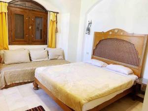 Katil atau katil-katil dalam bilik di Private Villa with heated pool and lagoon