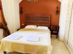 Katil atau katil-katil dalam bilik di Private Villa with heated pool and lagoon