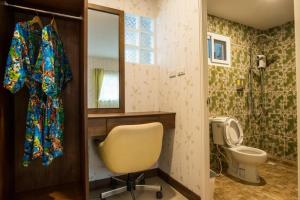 Et badeværelse på Sunday J Resort & Restaurant