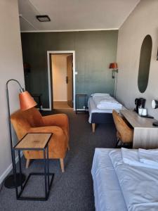 Postel nebo postele na pokoji v ubytování Verdde Hotel Lakselv