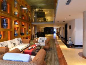 Posezení v ubytování Baodao Exhibition Center Hotel