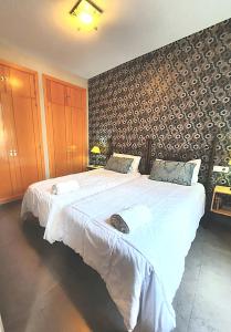 Postel nebo postele na pokoji v ubytování Apartamentos MalagaSol