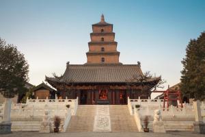 a large building with a large tower in the background at Xana Hotelle XiAn Gig Wild Goose Pagoda Branch in Xi'an