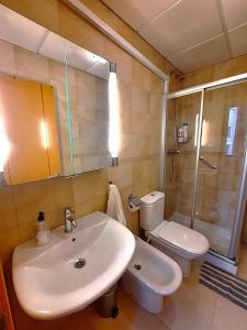 Koupelna v ubytování Apartamentos MalagaSol + 12 fotografií