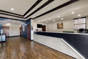 an empty lobby with a reception desk and a lobby at Comfort Inn & Suites Atoka in Atoka