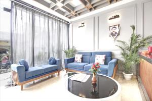 Posezení v ubytování Hotel Applewood Palace - Near Delhi International Airport With - free Airport Drop