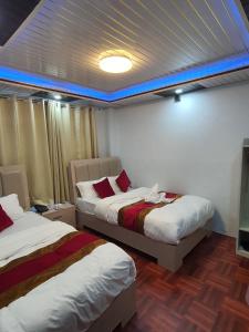 Charikot Downtown Hotel客房内的一张或多张床位