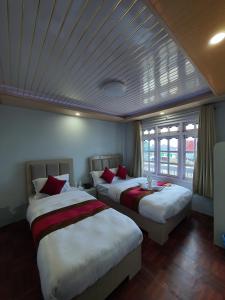 Charikot Downtown Hotel客房内的一张或多张床位