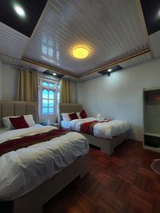 Charikot Downtown Hotel客房内的一张或多张床位