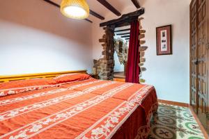 Casa Retiro Vilafamesにあるベッド