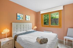 Postel nebo postele na pokoji v ubytování Ski Apartments El Tarter