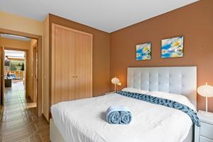 Postel nebo postele na pokoji v ubytování Ski Apartments El Tarter