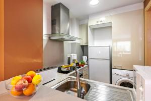 Kuchyň nebo kuchyňský kout v ubytování Ski Apartments El Tarter