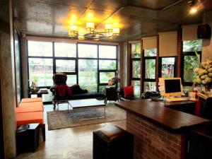 Posezení v ubytování De Aerng Boutique Hotel