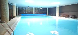 Bazén v ubytovaní Hotel Le Ginestre Family & Wellness alebo v jeho blízkosti