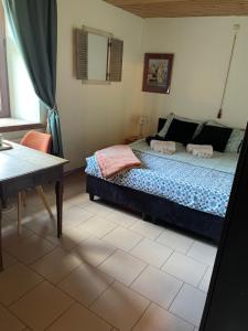 Voodi või voodid majutusasutuse B&B Forêt d'Animaux toas