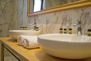 Kúpeľňa v ubytovaní Arktos Hotel