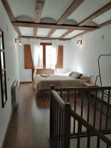 Katil atau katil-katil dalam bilik di Apartamentos Casa Memé