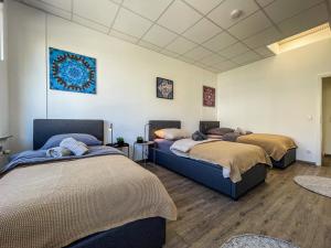 Katil atau katil-katil dalam bilik di Downtown Apartments