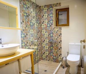 Kúpeľňa v ubytovaní Arktos Hotel