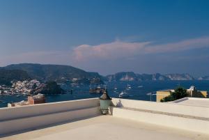 a view of the water from the balcony of a house at Villa Laetitia in Ponza
