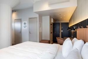 Ένα ή περισσότερα κρεβάτια σε δωμάτιο στο Radisson Blu Seaside Hotel, Helsinki
