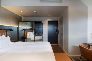 Ένα ή περισσότερα κρεβάτια σε δωμάτιο στο Radisson Blu Seaside Hotel, Helsinki