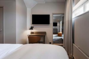 Ένα ή περισσότερα κρεβάτια σε δωμάτιο στο Radisson Blu Seaside Hotel, Helsinki