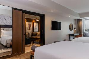 Ένα ή περισσότερα κρεβάτια σε δωμάτιο στο Radisson Blu Anchorage Hotel