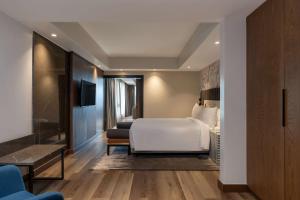 Ένα ή περισσότερα κρεβάτια σε δωμάτιο στο Radisson Blu Anchorage Hotel