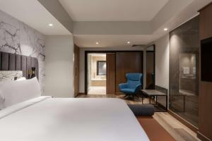 Posteľ alebo postele v izbe v ubytovaní Radisson Blu Anchorage Hotel