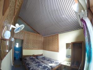 Postel nebo postele na pokoji v ubytování Apollo Bungalows