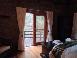 Postel nebo postele na pokoji v ubytování Umtsalane Private Game Farm