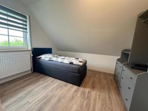 Ένα ή περισσότερα κρεβάτια σε δωμάτιο στο Ferienhaus Bei Schwarzkopf