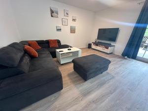 Μια τηλεόραση ή/και κέντρο ψυχαγωγίας στο Ferienhaus Bei Schwarzkopf