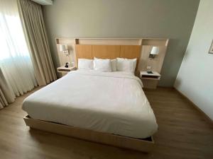 Letto o letti in una camera di Radisson Colon 2,000 Hotel & Casino