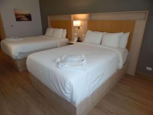 Letto o letti in una camera di Radisson Colon 2,000 Hotel & Casino