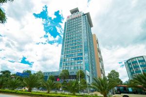 صورة لـ Echarm Hotel Qujing High-speed Railway Station Five Pavilions and One Center Branch في Qujing