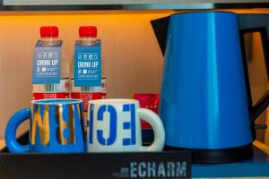 صورة لـ Echarm Hotel Qujing High-speed Railway Station Five Pavilions and One Center Branch في Qujing