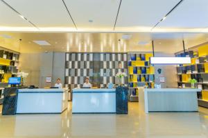صورة لـ Echarm Hotel Qujing High-speed Railway Station Five Pavilions and One Center Branch في Qujing