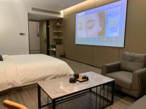 O zonă de relaxare la New Century Mansion Hotel Cixi Guanhaiwei