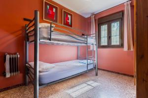 Ένα ή περισσότερα κρεβάτια σε δωμάτιο στο casa rural Ribera del Hueznar