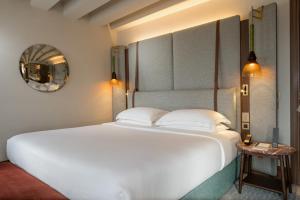 Ca'di Dio-Small Luxury Hotel客房内的一张或多张床位