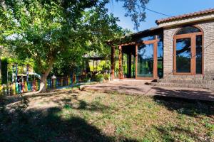 Κήπος έξω από το casa rural Ribera del Hueznar