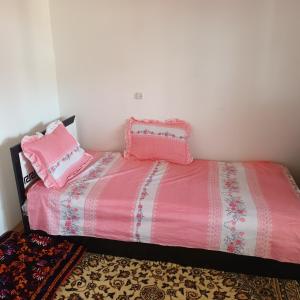 Postel nebo postele na pokoji v ubytování GetHouse Zohirshoh